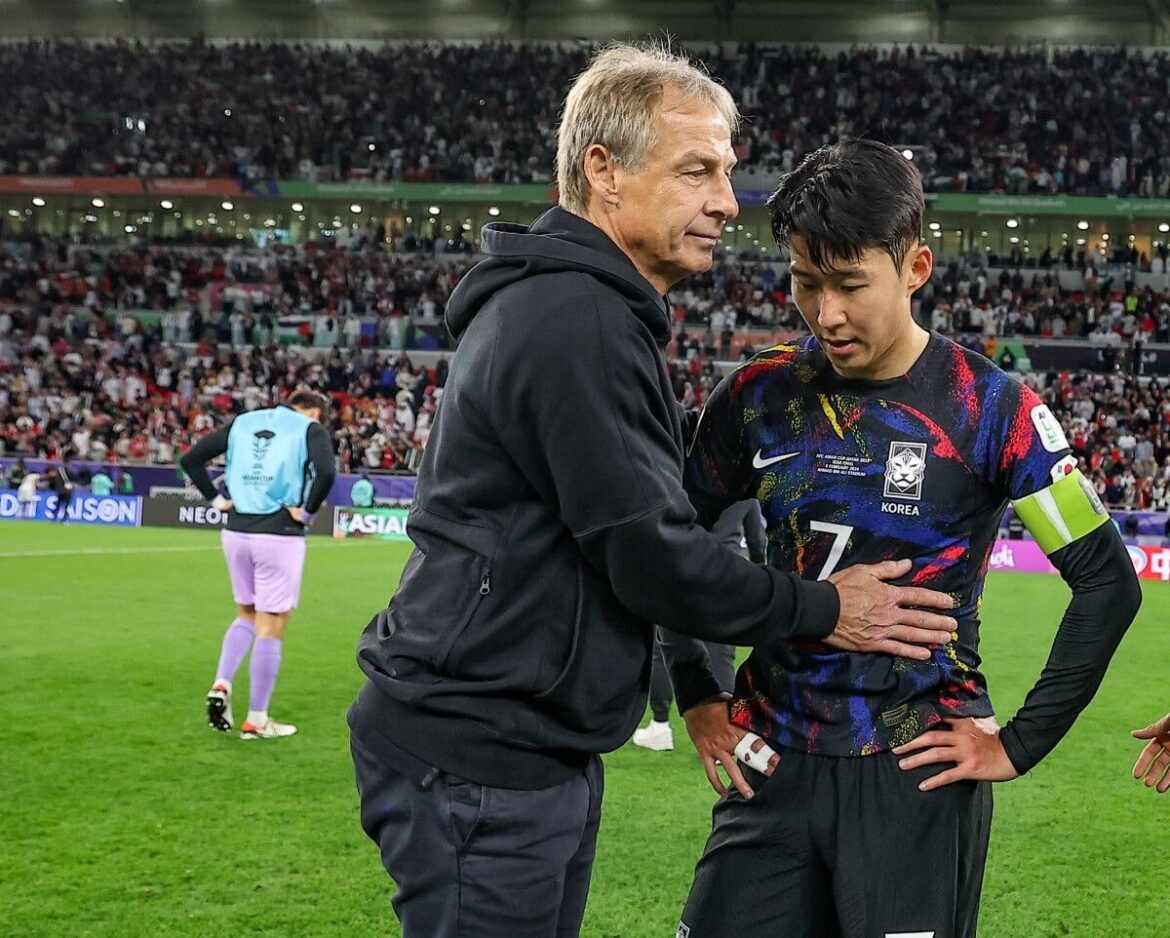Klinsmann and South Korea Captain Son Heung-Min after the semi-final defeat at AFC 2023-min
