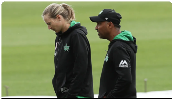 Dulip Samaraweera, right, talks to a female cricketer during training. The Ex-Sri Lanka batsman was handed a 20-year ban from Australian cricket