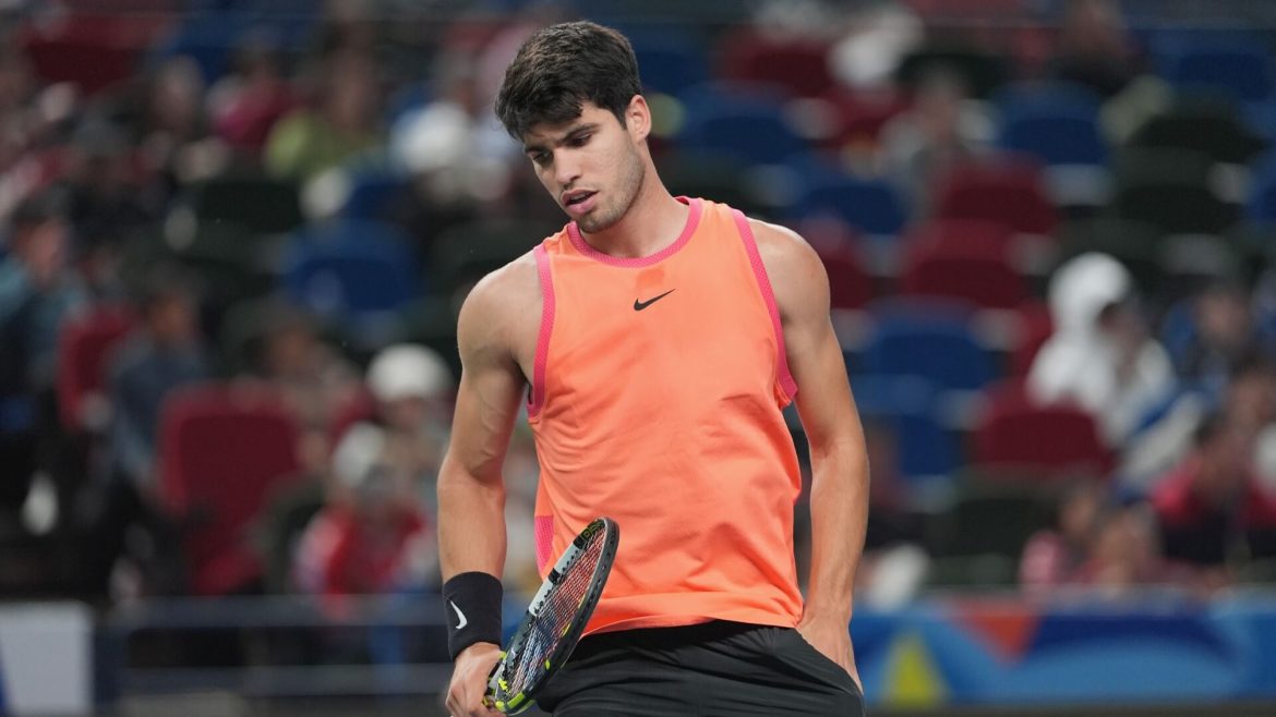 Carlos Alcaraz groans during a match break at the Shanghai Open. Expect Alcaraz to miss a semis matchup against Jannik Sinner after losing in the quarterfinals.