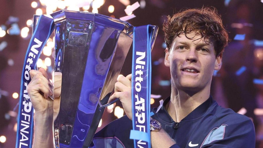 World No.1 Jannik Sinner raises his trophy in his final against Taylor Fritz on Sunday. Sinner drops Fritz to claim ATP Finals title