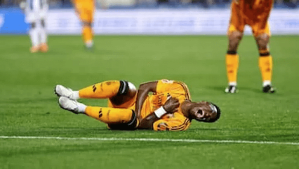 Real Madrid's Vinicius Junior (center) writhes in pain during a match in file photo. Vinicius Junior slams 'crazy calendar' schedule for hamstring injury