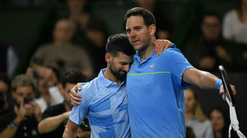 Novak Djokovic (left) was in tears as he hugs Juan Martin del Potro (right) after their exhibition match on Sunday. Djokovic 'grateful' to play with Del Potro in Argentine's last match