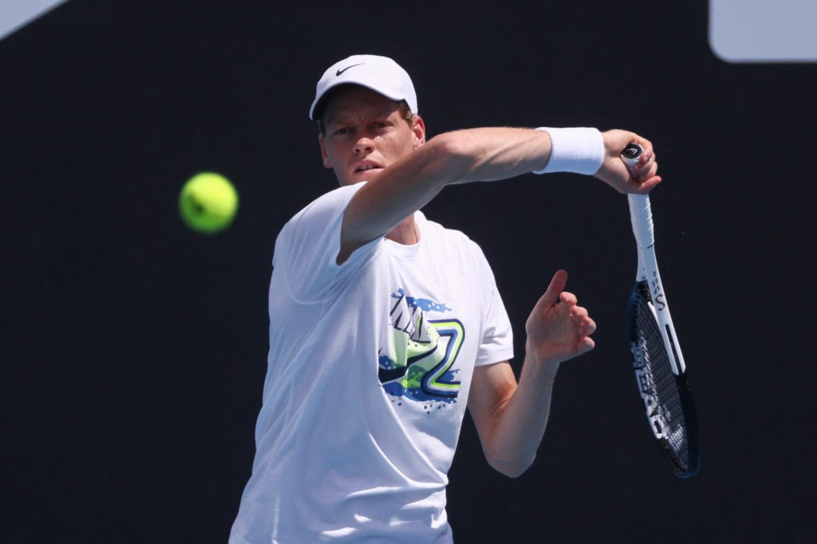 Italy's Jannik Sinner (middle) returns a shot in his Australian Open match against Nicolas Jarry on Monday. Sinner drops Jarry in Australian Open