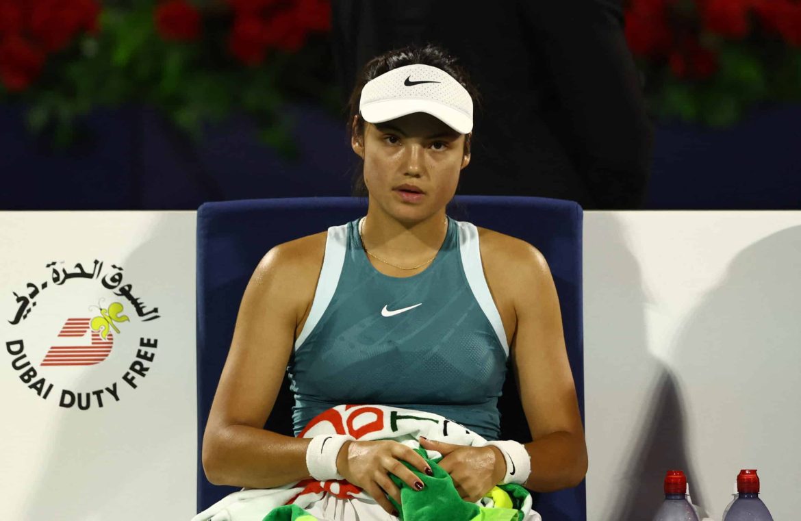 Britain's Emma Raducanu sits during a break during her match at the Dubai Championships on Tuesday. Raducanu concern prompts WTA to ban spectator from all events