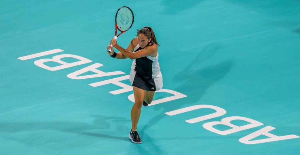 Russian Daria Kasatkina returns a serve at the Abu Dhabi Open on Monday. Abu Dhabi organizers say sorry for Spanish flag, Kasatkina pairing
