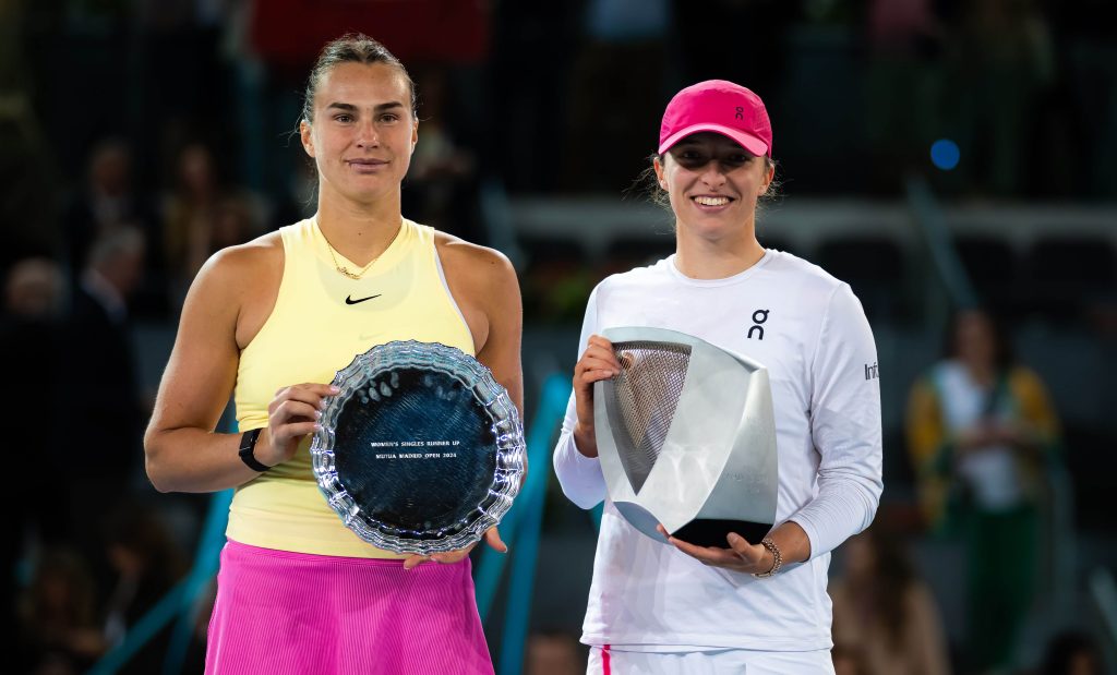 Belarus' Aryna Sabalenka (left) and Poland's Iga Swiatek (right) shared the stage on center court in file photo. Swiatek says Sabalenka rivalry 'something' the WTA is missing