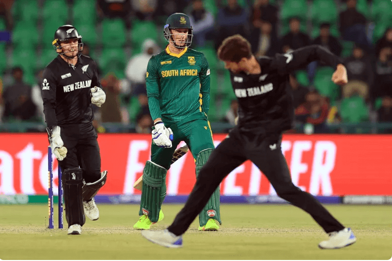 New Zealand's Mitchell Santner (right) pumps his fist in celebration after he bowled South Africa's Rassie van der Dussen (mniddle) during their match against South Africa in Lahore on Wednesday. New Zealand tops South Africa, reaches Champions’ Trophy final