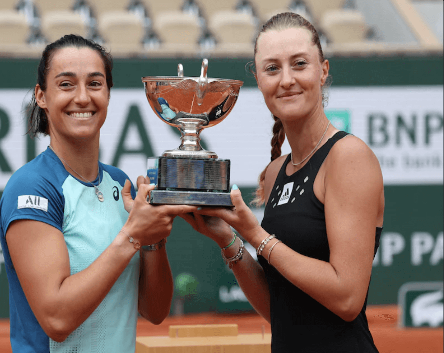 Caroine Garcia (left) holds the French Open 2022 women's doubles trophy with her partner Kristina Mladenovic (right) in file photo. Garcia to retire before home fans after French Open 2025