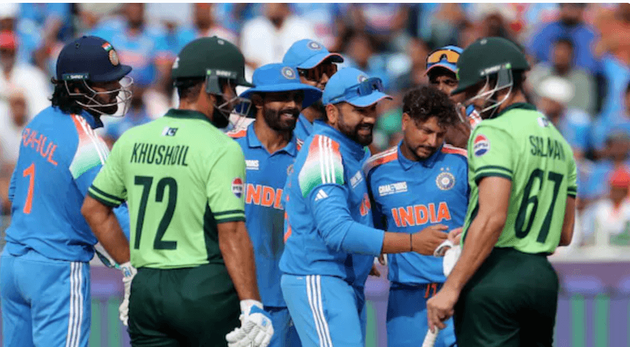 Players from India (in blue) and Pakistan (in green) shake hands at the pitch in file photo. ICC mulls non-grouping of India, Pakistan in events: BCCI source
