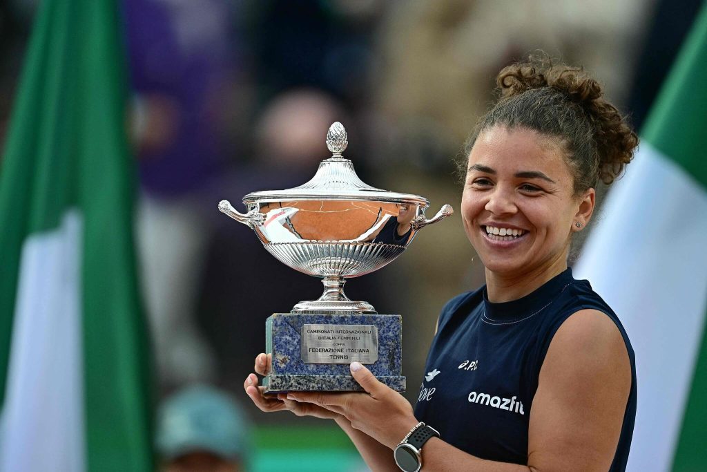 Italian Jasmine Paolini poses with her trophy after beating American Coco Gauff in the Italian Open women's singles final on Saturday. Alcaraz denies Sinner home win at Italian Open; Paolini tops Gauff