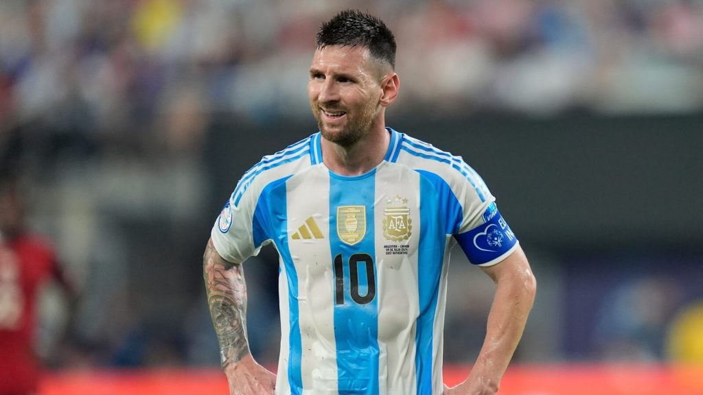 Argentina football legend Lionel Messi smiles at the crowd at a recent match in file photo. Romero's La Liga plan aims to help Messi's FIFA World Cup goals