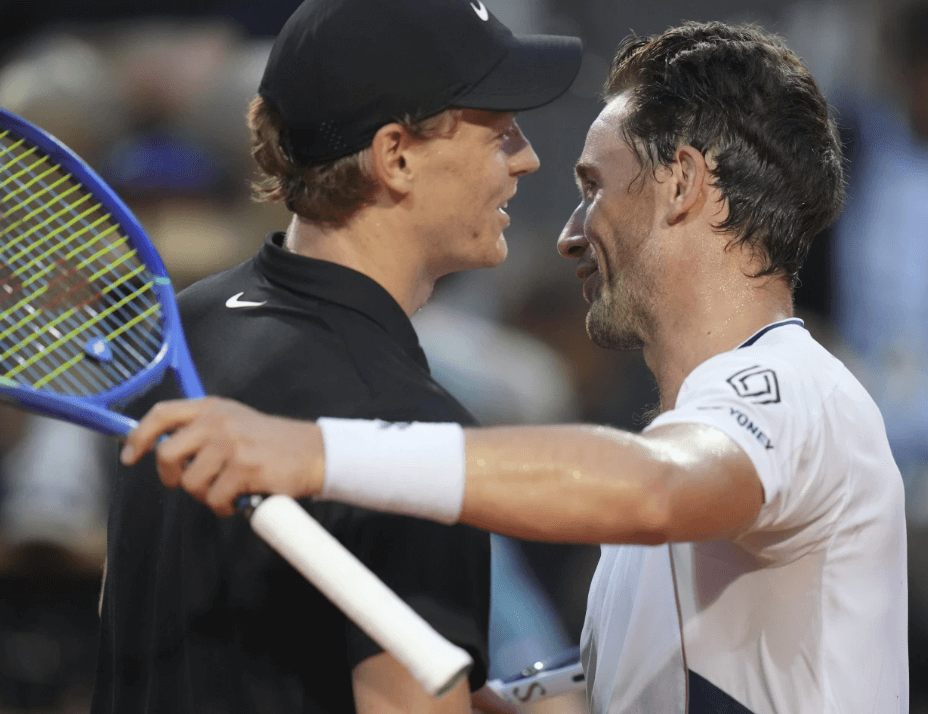 Italy's Jannik Sinner (left) and Norway's Casper Ruud (right) shake hands at enter court after their quarterfinals match in Rome on Thursday. Paul to get truck back after reaching Italian Open semis