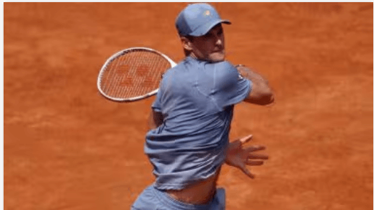 American Tommy Paul stretches to take a shot against Hubert Hurkacz in their Italian Open quarterfinals match on Thursday. Paul to get truck back after reaching Italian Open semis