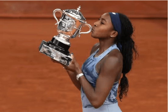 American Coco Gauff kisses her French Open 2025 women's singles final trophy after beating Belarus' Aryna Sabalenka in the final on Saturday. Gauff felt Sabalenka 'a bit emotional' on French Open comments