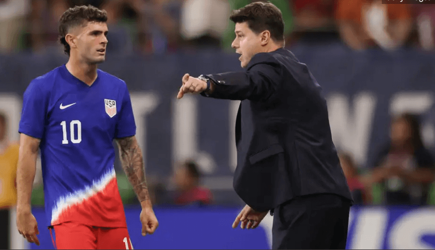 UMSNT manager Mauricio Pochettino (right) hollers instructions to star winger Christian Pulisic (left) in the sidleines at a recent match in file photo. Pochettino says he's 'not a mannequin' amid Pulisic comments