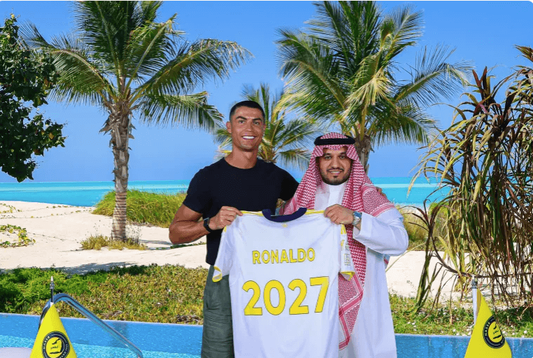 Portugal superstar footballer Cristiano Ronaldo (left) poses with Al Nassr club chairman Abdullah Al-Majid (right) after he signed a two-year contract extension with the club. Ronaldo declines Club World Cup stint for 'good rest