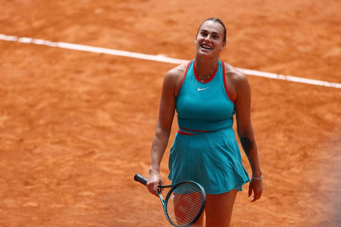 Belarus' Aryna Sabalenka smiles to the crowd in her French Open quarterfinal vs China's Zheng QInwen on Tuesday. Swiatek, Sabalenka arrange French Open semis clash; Alcaraz in last four