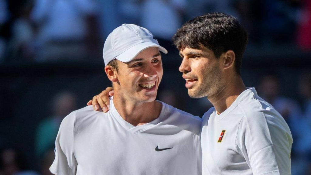 Spain's Carlos Alcaraz (right) shares a little chat with liver Tarvet (left) at Wimbledon 2025 on Wednesday.  Alcaraz dumps Tarvet at Wimbledon; Sabalenka lone top 5 seed left