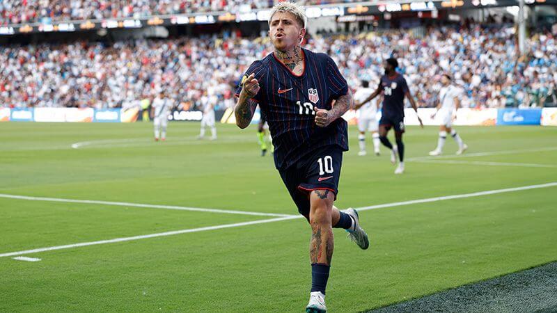 Diego Luna points his right index finger in celebration after his brace lifted the USMNT to the Gold Cup final with a 2-1 win over Guatemala on Wednesday. USA vs Guatemala has Luna lead Americans to Gold Cup final