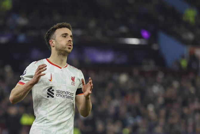 Forward Diogo Jota looks on to the crowd while playing for the Portuguese national men's team in file photo. Diogo Jota killed in accident 2 weeks after wedding