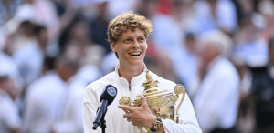 Italy's Jannik Sinner holds his Wimbledon trophy after beating Spain's Carlos Alcaraz in the men's singles final on Sunday. Sinner vs Alcaraz rivalry heats up as Italian wins Wimbledon final