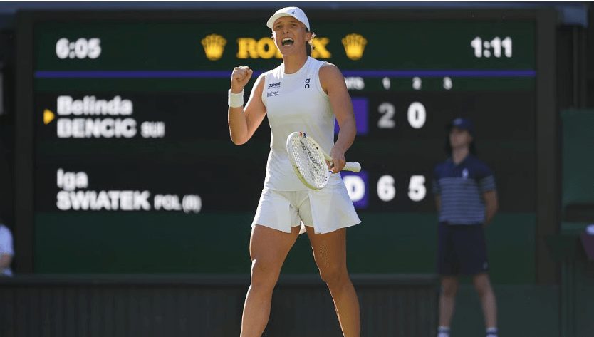 Poland's Iga Swiatek pumps her right fist after she defeated Belinda Bencic in the other Wimbledon women's singles semifinal on Thursday. Anisimova stuns Sabalenka to reach Wimbledon final vs Swiatek