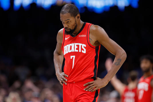 Newyy acquired Houston rockets forward Kewvin Durant looks on in his first game since being acquired from the Phoenix Suns in an off-season trade.
