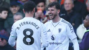 Our Crystal Palace vs Man United highights had Mason Mount (right) all smiles after his game-winning goal as teammate Bruno Fernandes (8, left) congratulates him.
